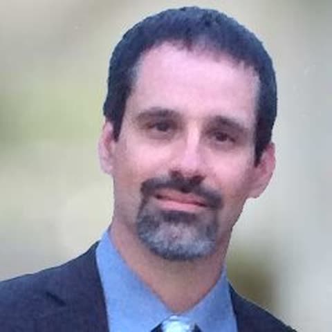 Portrait of Michael Suarez